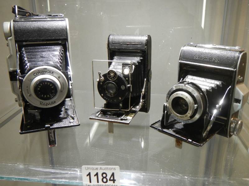 Three good vintage folding camera's.