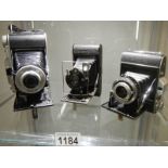 Three good vintage folding camera's.