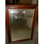 A mahogany framed mirror with engraved birds. COLLECT ONLY.