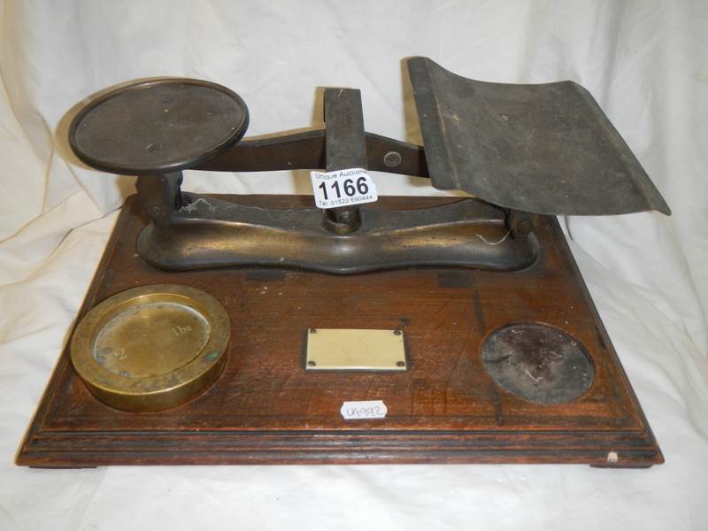 A set of Victorian brass postal scales.