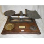 A set of Victorian brass postal scales.