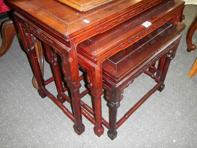 A good nest of three mahogany Chinese style tables, COLLECT ONLY. - Image 2 of 2