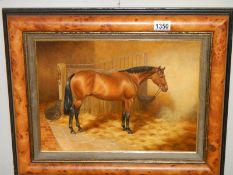 A framed oil on canvas featuring a horse in stable signed S Whigham, 1988.