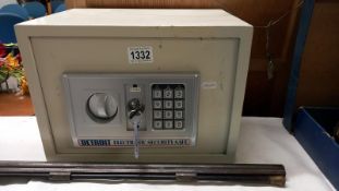 A combination Detroit Electronic safe.