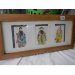 A framed and glazed set of three Chinese watercolours of Chinese gentlemen in one frame.