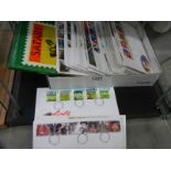 A Safari stamp album and a quantity of first day covers.