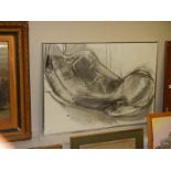 A framed and glazed charcoal nude study, signed but indistinct.