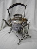 An early 20th century silver plate kettle on stand.