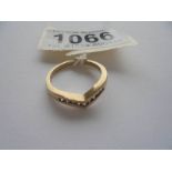 A 9ct gold ring fashioned as a wishbone, set diamonds, size N, 2.6 grams, .15 carat.