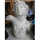 A heavy Italian marble bust of a young girl, 47 cm tall.