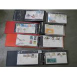 Four albums of first day covers.