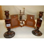 A pair of Edwardian wooden photo frames, pair of wooden candlesticks and a miniature spinning wheel.