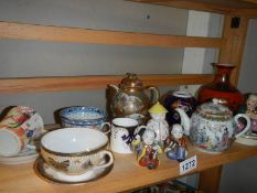 A mixed lot of oriental ceramics including tea ware.