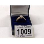 A 9ct gold ring set CZ?, size P, 3.2 grams.