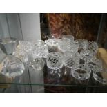 A quantity of cut glass napkin rings.