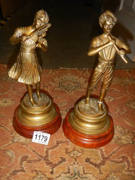 A pair of heavy brass figures. - Image 2 of 2