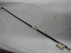 A violin bow stamped Vuillaume A Paris.