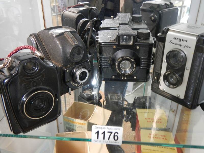 Four vintage camera's.