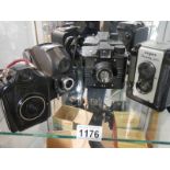 Four vintage camera's.