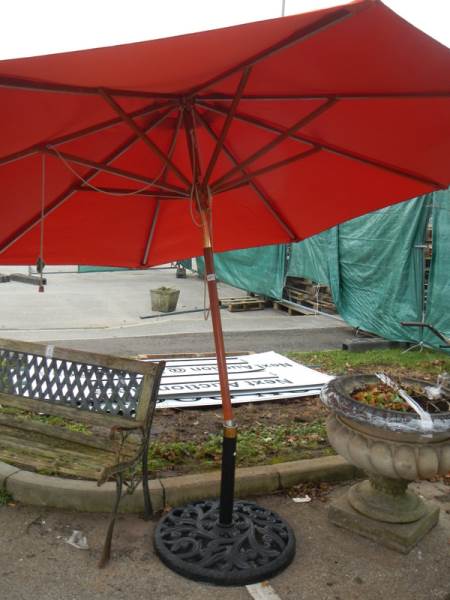 An adjustable garden parasol. COLLECT ONLY.