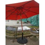 An adjustable garden parasol. COLLECT ONLY.