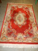 A Chinese patterned carpet, 265 x 153 cm, COLLECT ONLY.