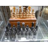 A 19/20th century wooden chess set.