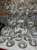 A Royal Crown Derby 'Black Aves' pattern dinner set, A1310, approximately 46 pieces.