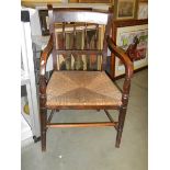 An old kitchen chair with rush seat, COLLECT ONLY.