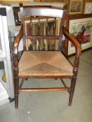 An old kitchen chair with rush seat, COLLECT ONLY.