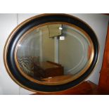 A good quality oval framed bevel edged mirror, COLLECT ONLY.