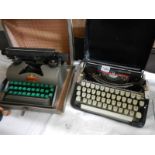 Two vintage typewriters.