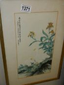 A framed and glazed signed Chinese watercolour featuring geese.