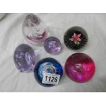 Six good glass paperweights including Caithness,.