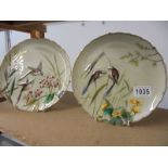 A pair of superb quality hand painted plated featuring birds.