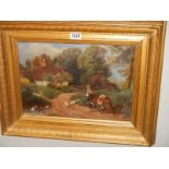A gilt framed oil on canvas rural farming scene.