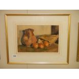 A framed still life oil painting.