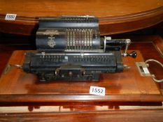 A vintage Maldiva Britannic calculating machine.