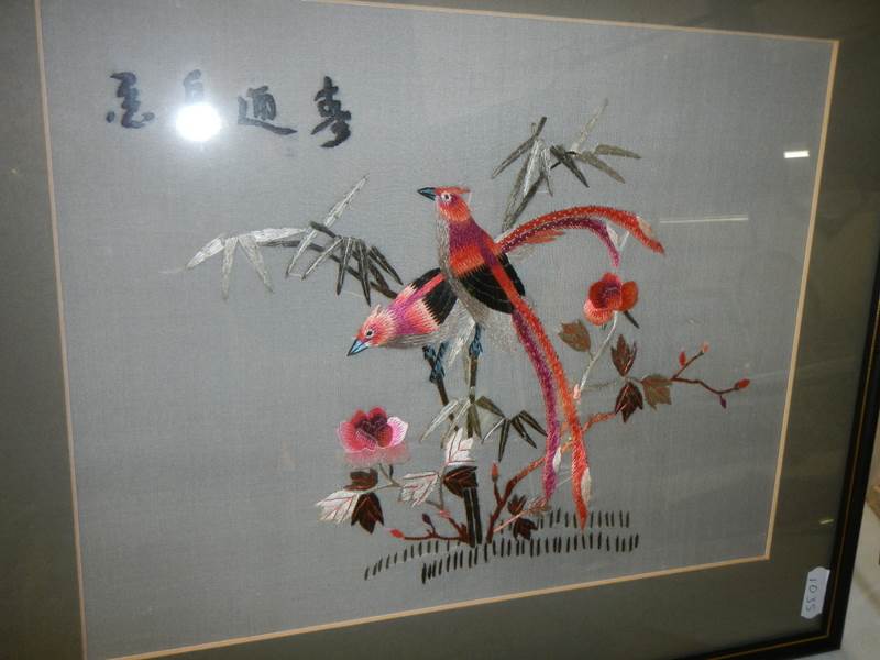 A framed and glazed Chinese embroidery featuring birds. - Image 2 of 2