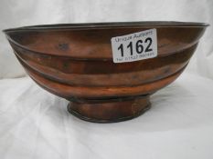 A Georgian copper jelly mould on footed base, 21 x 14 x 10 cm high.