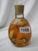 A bottle of 60 year old Dimple whisky.