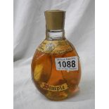 A bottle of 60 year old Dimple whisky.