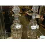 Two early 20th century decanters with labels.