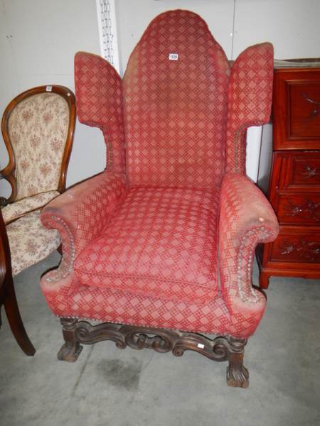 A huge Victorian throne style wing armchair, COLLECT ONLY.