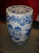 A blue and white Chinese garden stool. COLLECT ONLY.