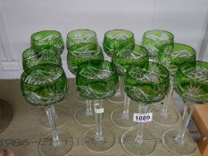 A good set of twelve overlaid long stemmed glasses.