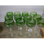 A good set of twelve overlaid long stemmed glasses.