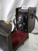 A good leather cased Microcord camera.