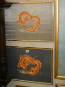 A pair of framed and glazed embroideries on silk of dragons.