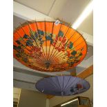 Two hand painted parasols.